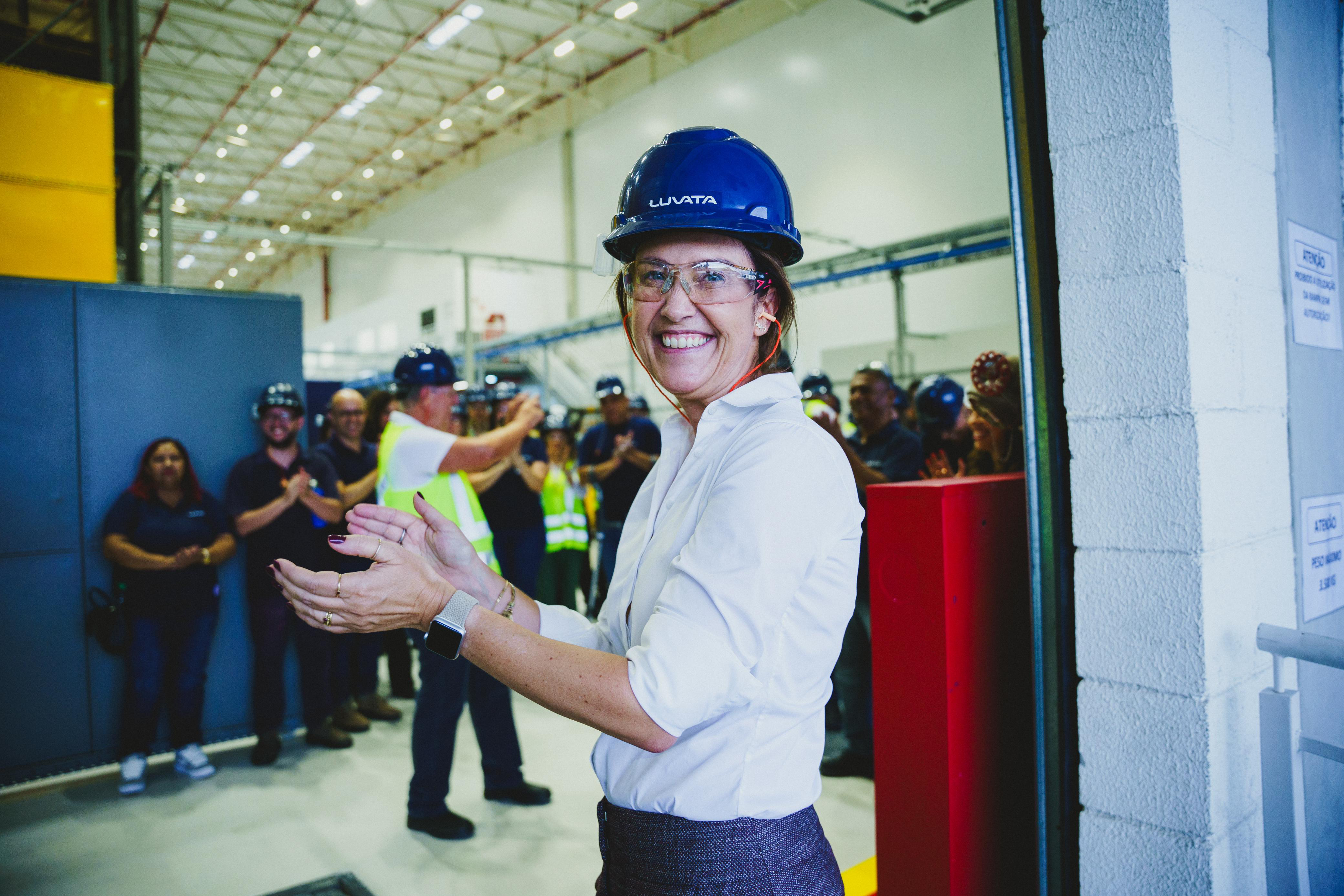 Leticia Maradei smiling and clapping hands