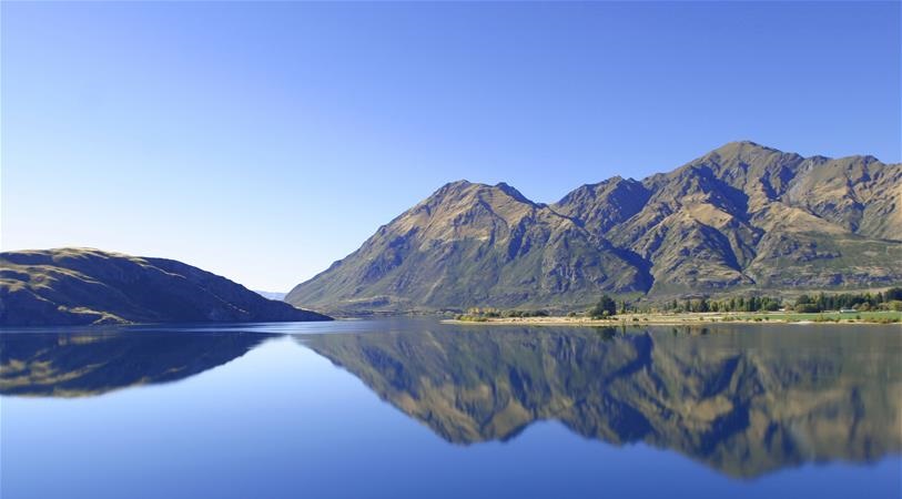 Beautiful scenery of a lake by the mountains
