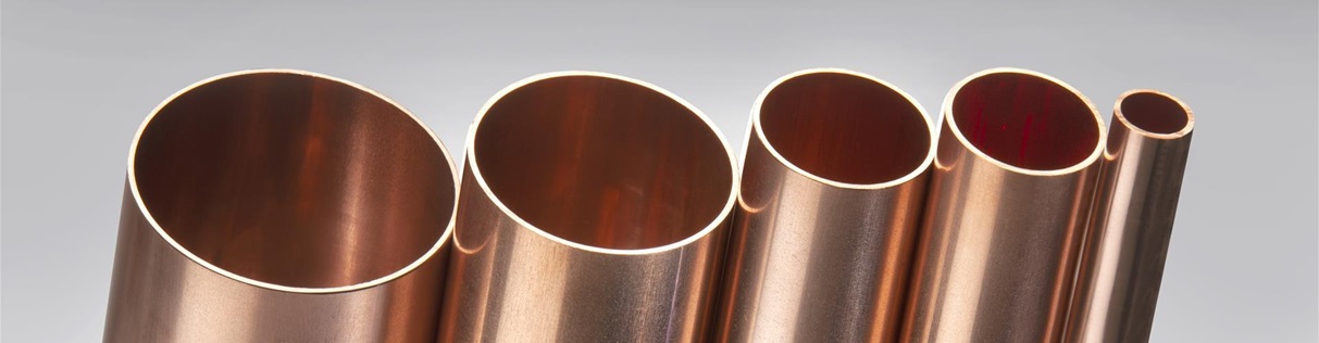 Shiny copper tubes in various diameters