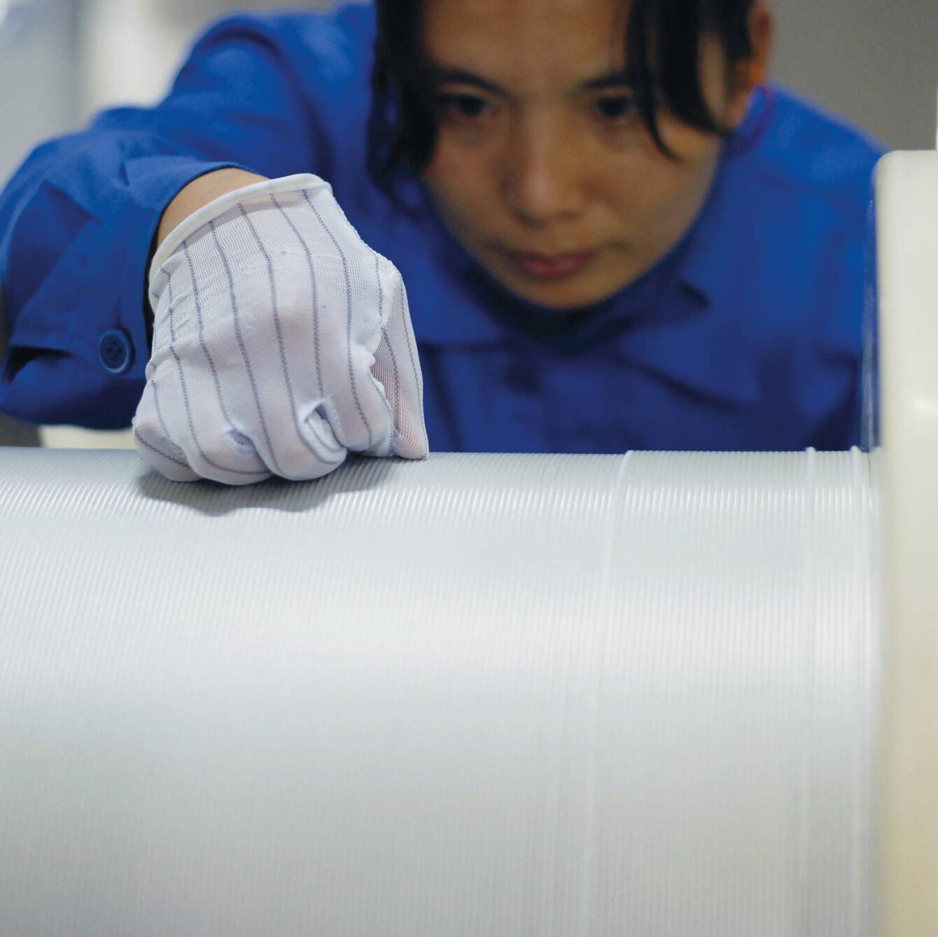 Luvata Zhongshan employee working with braided wire